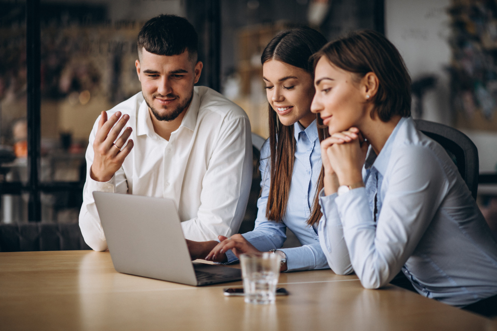 group-people-working-out-business-plan-office